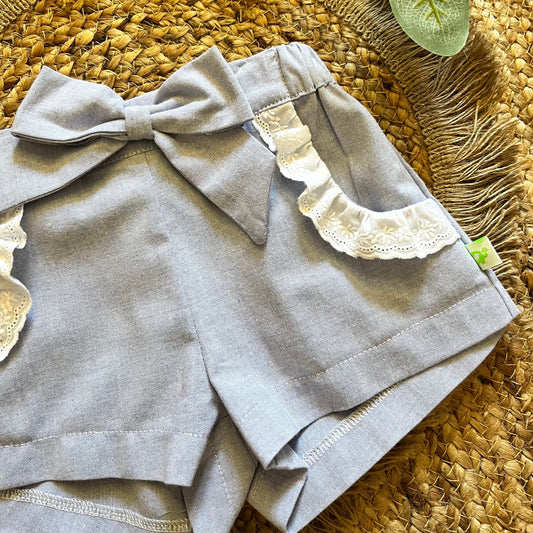 Short bambina elegante in Oxford celeste con ruches e elastico in vita