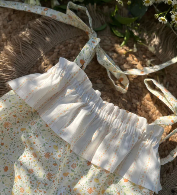 Body mare in cotone stampato e spalline annodate Rosa