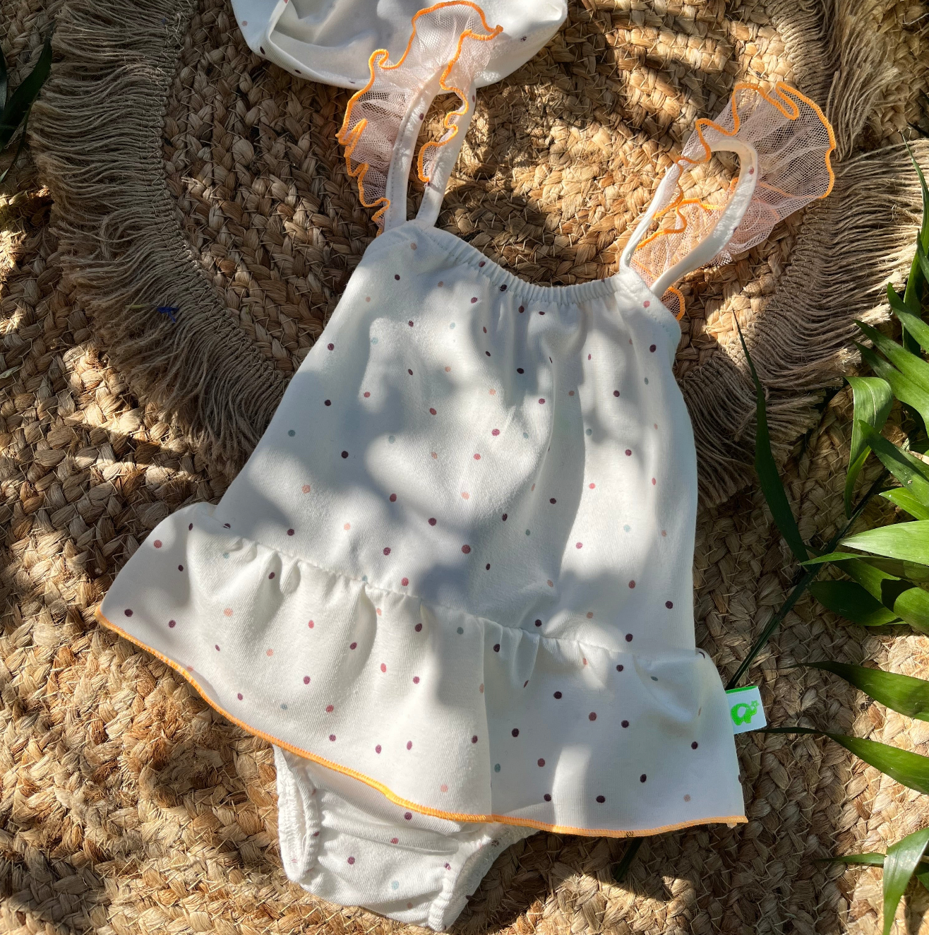 Costume intero mare con volant in Lycra stampata panna