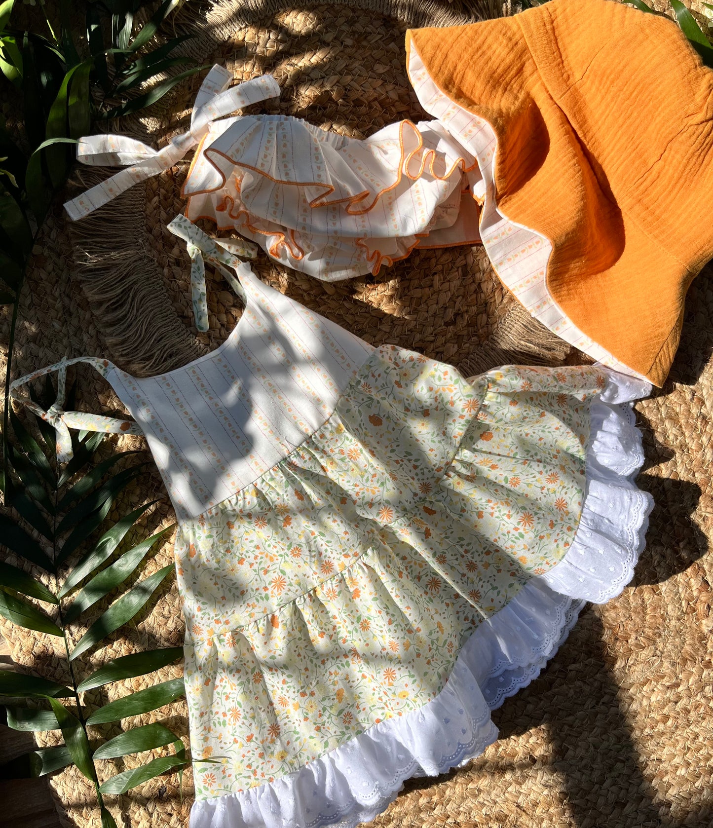 Set mare bambina con fiocchi in cotone micro-fantasia floreale arancio