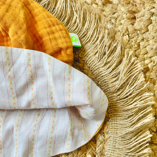 Set mare bambina con fiocchi in cotone micro-fantasia floreale arancio