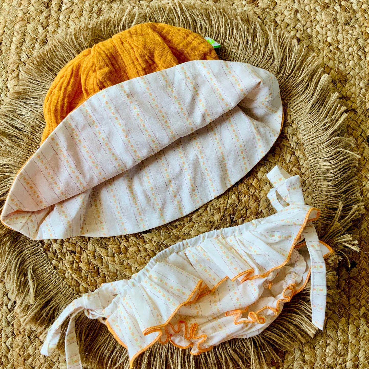 Set mare bambina con fiocchi in cotone micro-fantasia floreale arancio